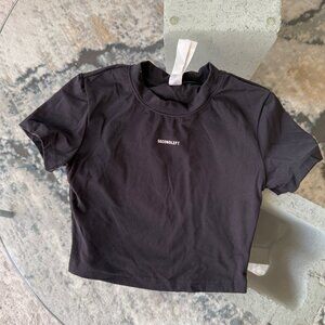 Second left black tee